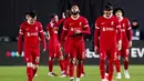 Pemain Liverpool tertunduk lesu setelah disingkirkan Atalanta dari Liga Europa di Gewiss Stadium, Jumat (19/4/2024). (AP Photo/Antonio Calanni)