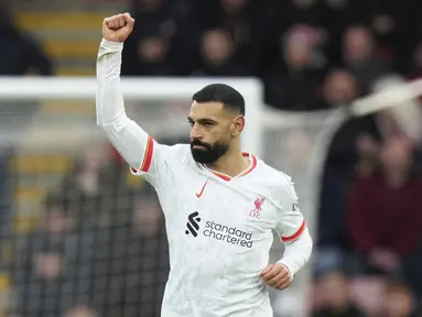Pemain Liverpool, Mohamed Salah melakukan selebrasi setelah mencetak gol ke gawang Bournemouth dalam laga lanjutan Liga Inggris 2024/2025 di Vitality Stadium, Bournemouth, Inggris, Sabtu (02/02/2025). (AP Photo/Alastair Grant)