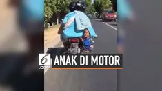 Seorang ibu yang sedang dibonceng motor nekat menaruh anaknya di keranjang. Mirisnya, keranjang tersebut berada tepat di atas knalpot. Pemandangan tak lazim ini berhasil direkam oleh pengendara lainnya.