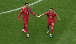 Cristiano Ronaldo dan Francisco Conceiciao dari Portugal bereaksi saat menjalani pertandingan Grup K Piala Dunia FIFA 2026 antara Portugal melawan DR Kongo di Houston Stadium, Houston, Texas, pada 17 Juni 2026. (Lars Baron / GETTY IMAGES NORTH AMERICA / Getty Images via AFP)
