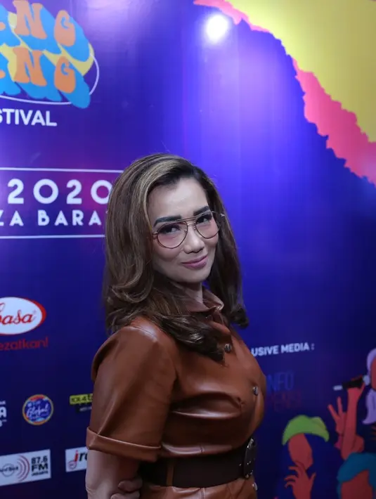 Reza Artamevia saat hadir dalam jumpa pers konser musik bertajuk Festival Berdendang Bergoyang 2020 di kawasan Kebayoran Baru, Jakarta Selatan, Kamis (9/1/2020).  (Daniel Kampua/Fimela.com)