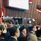 Presiden Joko Widodo atau Jokowi saat tiba di Ruang Rapat Paripurna, Gedung Nusantara MPR/DPR/DPD RI, Jakarta, Selasa (16/8/2022). Sementara itu, Ibu Iriana tampil anggun dengan mengenakan kebaya berwarna pink lengkap dengan hijab berwarna senada dilengkapi kain batik berwarna cokelat. (Foto: Laily Rachev - Biro Pers Sekretariat Presiden)