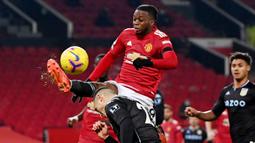 Aaron Wan-Bissaka - Benteng kokoh Manchester United ini adalah momok bagi semua penyerang di Premier League. Meski tangguh dalam duel satu lawan satu namun Wan-Bissaka tidak cukup mahir saat menyerang. (Laurence Griffiths/POOL/AFP)