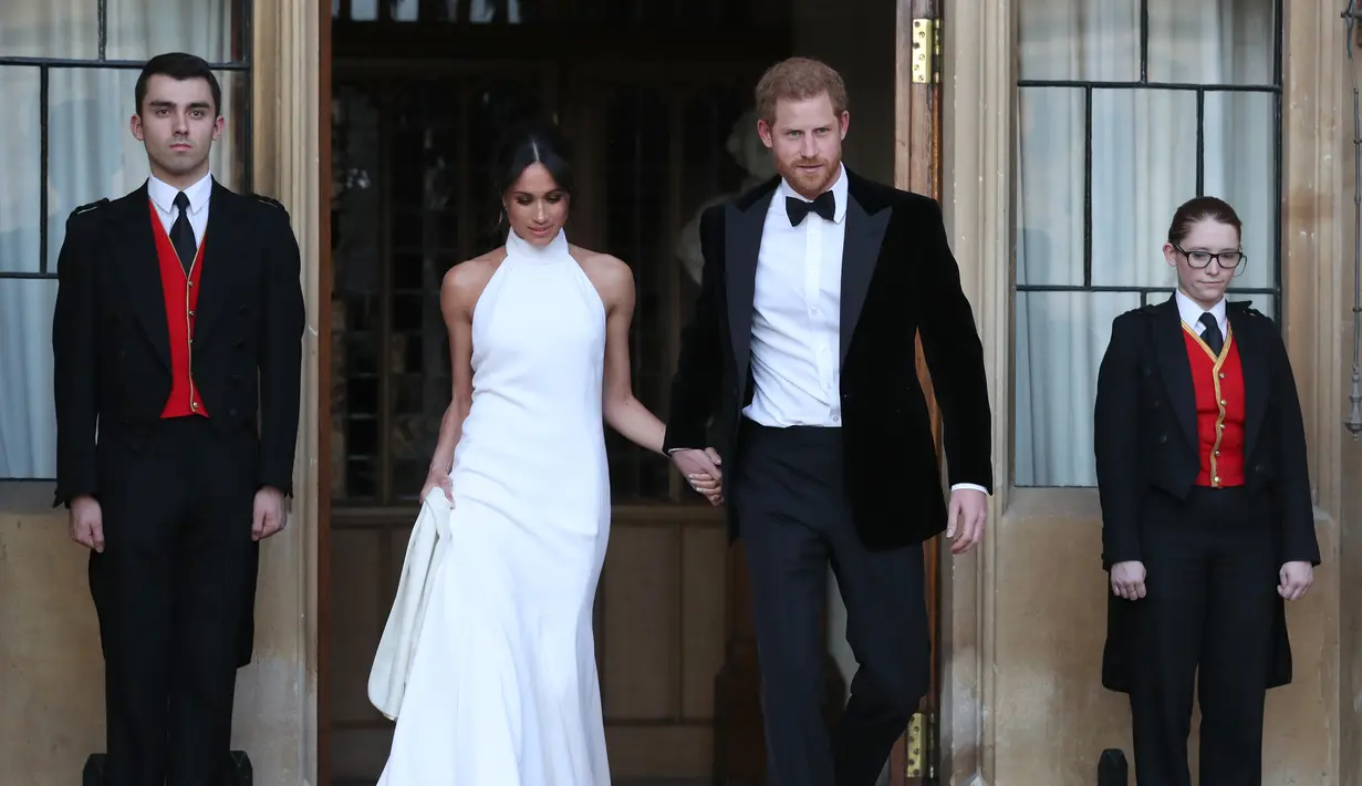 Patung lilin Meghan Markle dan Pangeran Harry akhirnya dibuat oleh Madame Tussauds. (STEVE PARSONS  POOL  AFP)