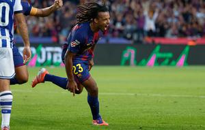 Ekspresi Jules Kounde usai menjebol gawang Real Sociedad di ajang La Liga, Minggu (28/9/2025) (AP Photo/Joan Monfort)