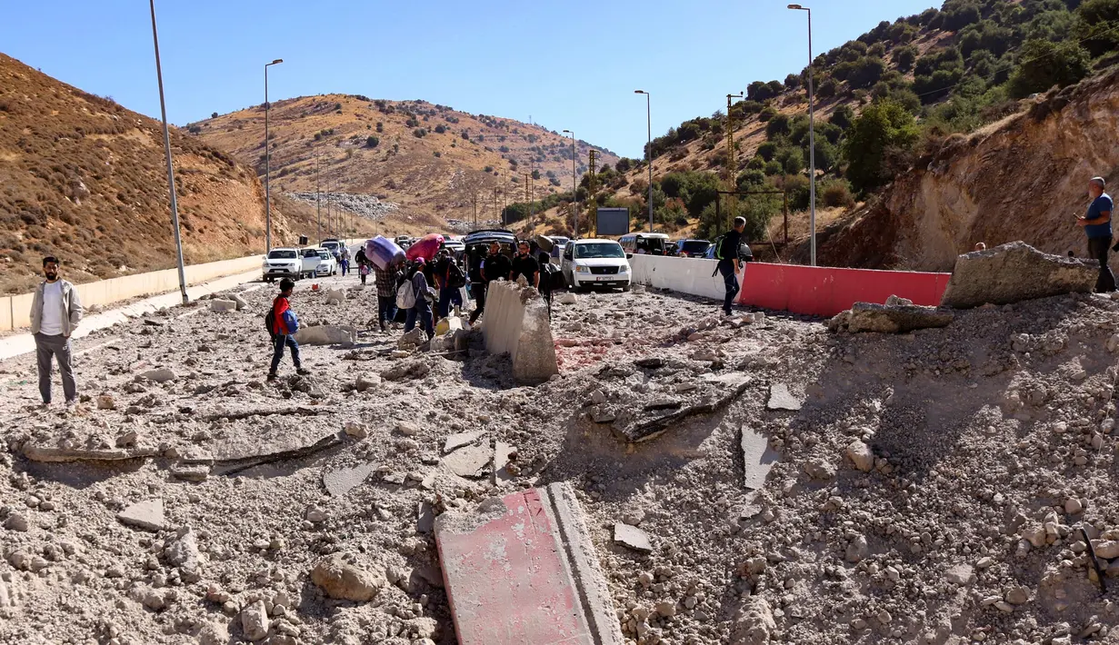 <p>Kementerian Kesehatan Lebanon mengatakan, sejak 16 September 2024 jumlah korban tewas akibat serangan Israel di Lebanon menjadi 1.030 orang dan 6.352 lainnya cedera. (HASSAN JARRAH/AFP)</p>