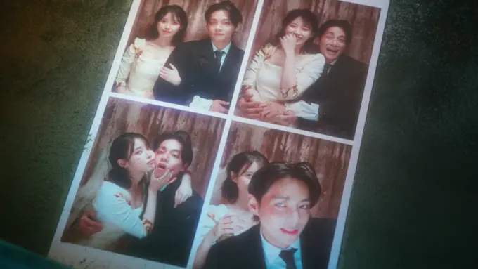 IU dan V BTS dalam video musik "Love Wins All". [Foto: YouTube/IU Official]