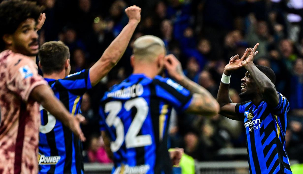 Kemenangan ini mengantar Inter Milan naik ke peringkat 2 klasemen sementara Serie A dengan perolehan 14 poin dari tujuh pertandingan. (Piero CRUCIATTI/AFP)