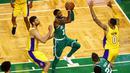Aksi pemain Boston Celtics, Kyrie Irving #11 melewati adangan para pemain Los Angeles Lakers pada laga NBA basketball game di TD Garden, Boston, (8/11/2017). Celtics menang 107-96.   (Tim Bradbury/Getty Images/AFP)