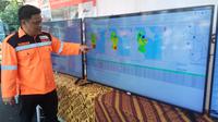 Warna merah menjadi sinyal titik hostpot yang dilihat dari layar Fire Weather Index (FWI) APP Sinar Mas (LIputan6.com / Nefri Inge)