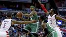 Pebasket Boston Celtics, Isaiah Thomas, berusaha melewati hadangan pebasket Washington Wizards,  Markieff Morris dan John Wall, pada Gim 3 semifinal Wilayah Timur, Kamis (4/5/2017). Washington Wizard menang 116-89. (AP/Andrew Harnik)