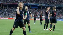 Kapten timnas Kroasia, Luka Modric merayakan gol ke gawang Argentina pada pertandingan Grup D Piala Dunia 2018 di Nizhy Novgorod Stadium, Rusia, Jumat (22/6). Argentina yang diperkuat Lionel Messi bertekuk lutut dari Kroasia, 0-3. (AP/Ricardo Mazalan)