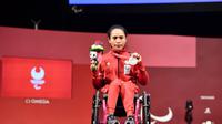 Lifter Ni Nengah Widiasih meraih medali perak pada Paralimpiade Tokyo 2020 setelah turun di kelas 41 kg putri.