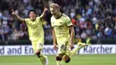 Arsenal pun unggul 1-0 setelah tendangan bebas langsung kaki kiri Martin Odegaard melesat mulus ke sisi kanan atas gawang Nick Pope. (PA via AP/Anthony Devlin)