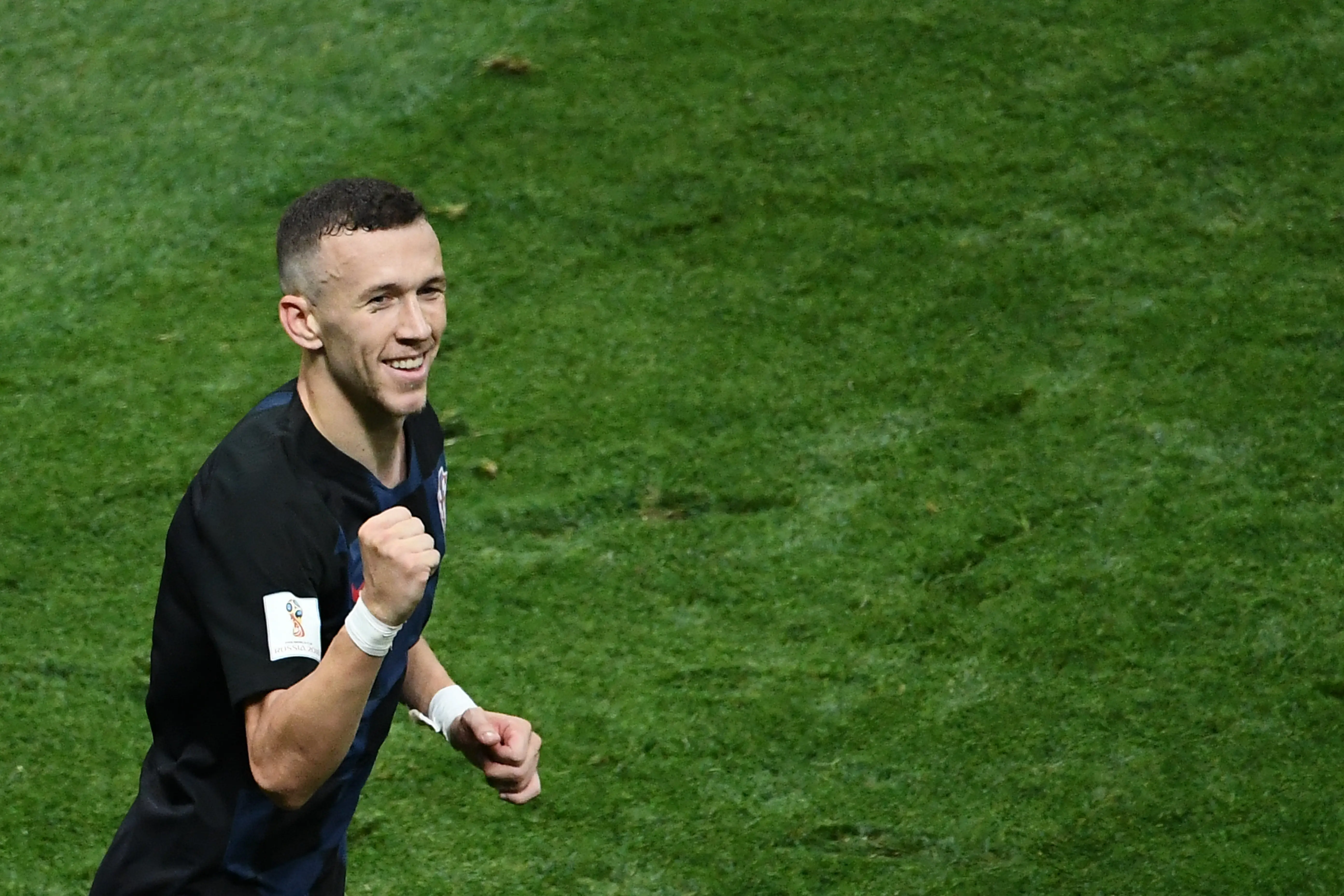 Ivan Perisic menyumbang gol saat Timnas Kroasia menyingkirkan Inggris di semifinal Piala Dunia 2018. (Jewel SAMAD / AFP)