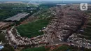 Foto udara di kawasan Tempat Pengolahan Sampah Terpadu (TPST) Bantar Gebang, Bekasi, Jawa Barat, Selasa (17/1/2023). Fasilitas Landfill Mining dan Refused Derived Fuel (RDF) Plant di TPST Bantar Gebang dari Pemprov DKI Jakarta akan dioperasikan pada tahun 2023. (merdeka.com/Imam Buhori)