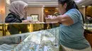 Pergerakan harga emas beberapa hari terakhir menunjukkan dinamika pasar global yang masih fluktuatif. (BAY ISMOYO/AFP)