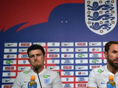 Gareth Southgate selaku pelatih Timnas Inggris telah mengumumkan 26 nama pemain yang akan dibawa ke Piala Dunia 2022 termasuk membuat kejutan membawa pemain Manchester United, Harry Maguire yang jarang tampil dibawah asuhan Erik Ten Hag. (AFP/Paul Ellis)