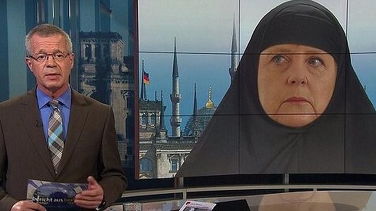 Stasiun TV Jerman pajang foto Angela Merkel berjilbab hitam