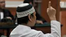 Terdakwa kasus terorisme Wawan Kurniawan alias Abu Afif saat menjalani sidang vonis di Pengadilan Negeri Jakarta Barat, Kamis (13/9). Majelis hakim menjatuhi hukuman Abu Afif dengan kurungan penjara selama 11 tahun. (Merdeka.com/Iqbal S. Nugroho)