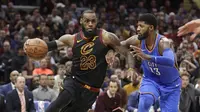 Paul George (kanan) cetak poin tertinggi saat Thunder hajar Cavaliers (AP Photo/Tony Dejak)