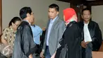 Ekspresi terdakwa kasus suap anggota DPR, Abdul Khoir usai menjalani sidang pembacaan putusan di Pengadilan Tipikor, Jakarta, Kamis (9/6/2016). Abdul Khoir divonis 4 tahun penjara. (Liputan6.com/Helmi Afandi)