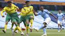 Pemain Manchester City, Raheem Sterling, melepaskan tendangan ke gawang Norwich City pada laga Premier League di Stadion Etihad, Minggu (26/7/2020). Manchester City menang dengan skor 5-0. (AP Photo/Dave Thompson, Pool)