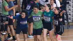 Selebritas Indonesia, Cinta Laura (kedua kanan) melakukan selebrasi bersama timnya (kiri ke kanan) Bastian Steel, Raditya Dika, dan Aqeela Calista setelah memenangkan lomba lari estafet 400 meter nomor campuran Turnamen Olahraga Selebriti Indonesia (TOSI) di GOR UNJ, Rawamangun, Jakarta, Minggu (30/07/2023). Mereka berhasil finis dengan catatan waktu 1 menit 0,59 detik. (Bola.com/Bagaskara Lazuardi)