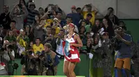 Petenis Puerto Rico, Monica Puig, menjuarai cabang tenis putri Olimpiade Rio de Janeiro 2016. Sementara Rafael Nadal harus mengubur mimpinya ke final. (REUTERS/Toby Melville)