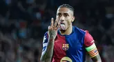Raphinha terus menunjukkan ketajamannya dalam urusan menjebol gawang lawan. Di Liga Champions musim ini, pemain Barcelona itu sukses menempati posisi teratas sebagai pencetak gol terbanyak sementara dengan koleksi 11 gol. (AP Photo/Joan Monfort)
