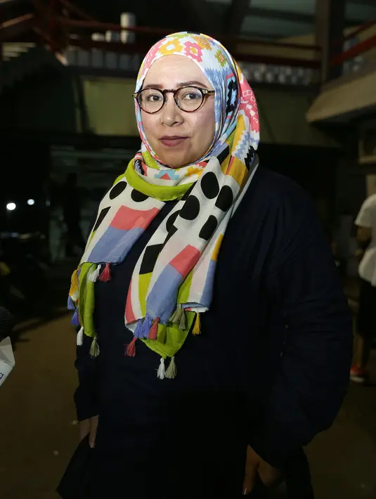 "Karena biasanya sering salah lirik. Kalau duet kan kasihan banget, teman duet nanti bisa pusing," ujar Melly Goeslaw usai gladi resik di Istora Senayan, Jakarta Pusat, Selasa (23/8). (Galih W. Satria/Bintang.com)