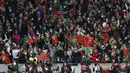 Hasil tersebut membuat Portugal selangkah lagi lolos ke Piala Dunia 2022. Di partai penentuan pasukan Fernando Santos akan bersua Makedonia Utara yang sukses membungkam Italia. (AP/Luis Vieira)