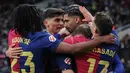 Kemenangan ini membuat Barcelona kokoh di puncak klasemen sementara La Liga 2024/2025 dengan 57 poin dari 26 pertandingan. (LLUIS GENE/AFP)