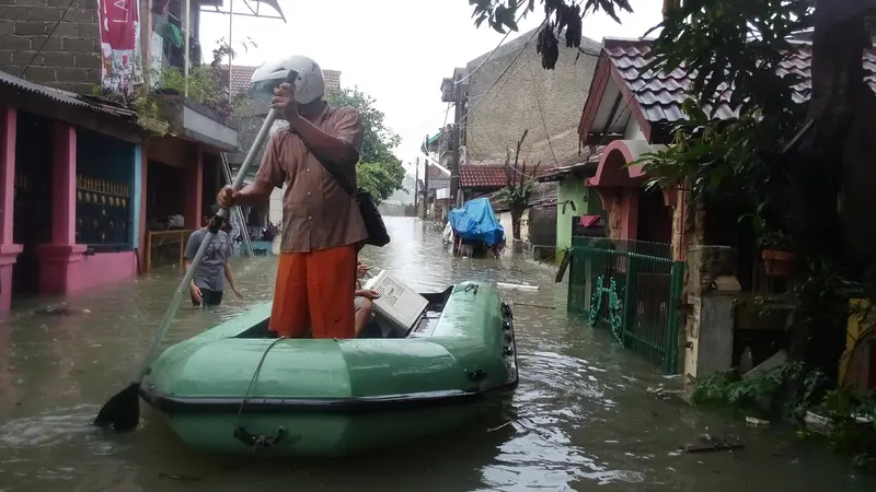 Banjir di perumahan Tangerang. (Liputan6.com/Naomi Trisna)