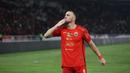 <p>Selebrasi pemain Persija Jakarta, Marko Simic setelah menjebol gawang Persis Solo pada laga pekan ke-31 BRI Liga 1 2023/2024 di Stadion Utama Gelora Bung Karno (SUGBK) Senayan, Jakarta, Rabu (17/4/2024) malam WIB. (Bola.com/M Iqbal Ichsan)</p>