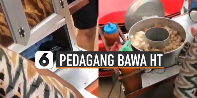 VIDEO: Kocak, Pedagang Bakso Malang Bawa HT Saat Jualan