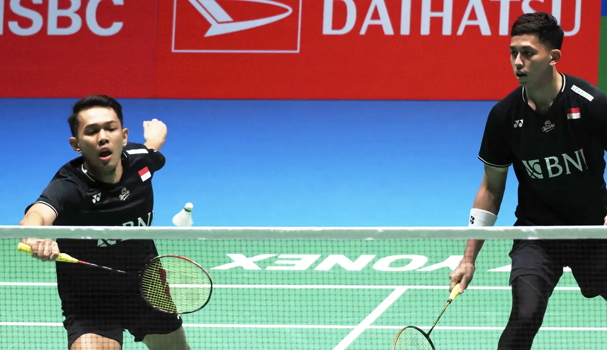 Fajar/Rian kalah dua game langsung dari pasangan Chinese Taipei tersebut. (Photo by Toshifumi KITAMURA / AFP)
