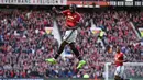 Ekspresi pemain Manchester United, Romelu Lukaku usai membobol gawang Everton pada lanjutan Premier League di Old Trafford, Manchester (17/9/2017). MU menang 4-0. (AFP/Oli Scarff)