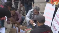 Warga Jakarta Kumpulkan Koin untuk Belikan Jokowi Truk Sampah