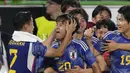 Pemain Timnas Jepang, Takefusa Kubo (tengah), melakukan selebrasi bersama rekan satu timnya setelah berhasil mengalahkan Jerman dalam pertandingan persahabatan yang berlangsung di Volkswagen Arena, Wolfsburg, Minggu (10/9/2023). (AP Photo/Martin Meissner)