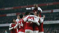 Para pemain Arsenal merayakan gol yang dicetak ke gawang Burnley dalam lanjutan Premier League 2017-2018 di Emirates Stadium, Sabtu 20/1/2018). (AP Photo/Frank Augstein)