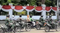 Tentara Nasional Indonesia (TNI) ikut melalukan patroli skala besar di sejumlah kota besar di Indonesia, termasuk Jakarta. (Liputan6.com/Muhammad Radityo Priyasmoro)