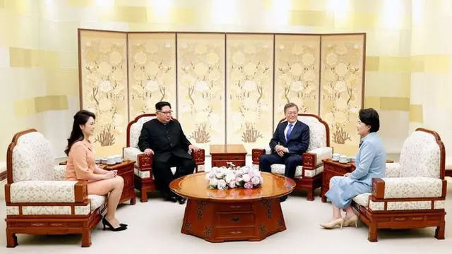Kim Jong-un dan Ri Sol-ju (Foto: AFP)