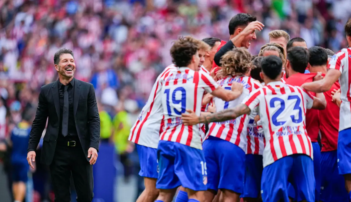 Hasil ini membawa Atletico naik ke peringkat keemoat klasemen sementara dengan 12 poin. Sementara Real Madrid tetap di puncak klasemen dengan 18 poin. (AP Photo/Manu Fernandez)
