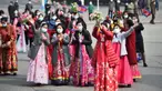 Orang-orang merayakan Hari Perempuan Internasional di alun-alun Teater Agung Pyongyang di Pyongyang, Korea Utara pada Rabu 8 Maret 2023. Hari Perempuan Internasional atau International Women's Day (IWD) diperingati setiap tanggal 8 Maret. Hari Perempuan Internasional banyak dirayakan di sejumlah negara di dunia. (KIM Won Jin/AFP)