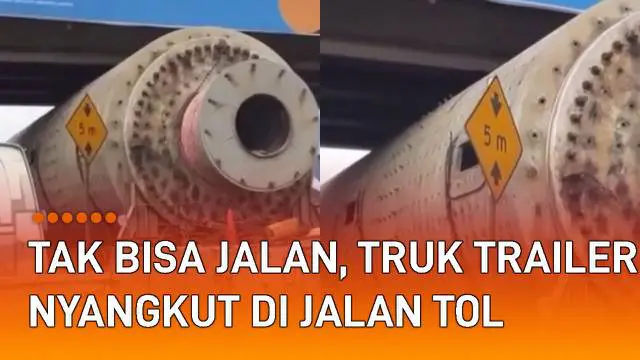 Sebuah truk trailer nyangkut di jalan tol mengundang perhatian.