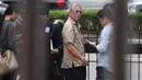 Presdir Jakarta Royale Golf, Muljono Tedjokusumo usai sidang perdana kasus pemalsuan surat dan menempatkan keterangan palsu pada akta autentik di PN Jakbar, Rabu (7/11). Muljono dijerat dengan Pasal 263 dan 266 KUHP. (Merdeka.com/Arie Basuki)