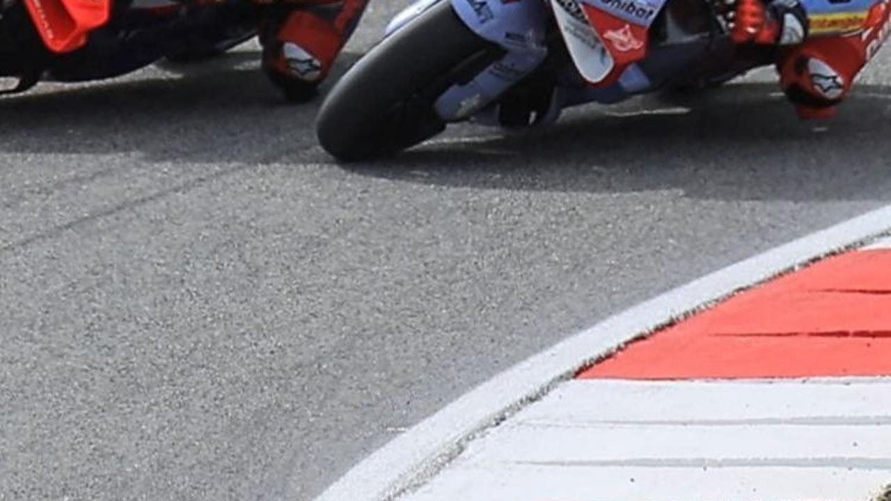 Duel tersebut akhirnya, dimenangkan&nbsp;Marquez yang sukses meraih podium kedua, di bawah Maverick Vinales yang berhasil finis terdepan di MotoGP Portugal 2024.&nbsp;AFP Photo<br>