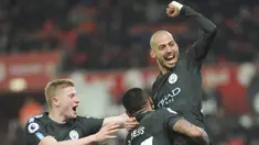 Ekspresi pemain Manchester City, David Silva usai membobol gawang Sotke City pada lanjutan Premier League di Bet 365 Stadium, Stoke, (13/3/2018). Manchester City menang 2-0. (AP/Rui Vieira)