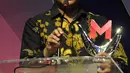 EVP Pengembangan dan Jasa Razaq Manan Ahmad penerima Merdeka Award 2023 Bidang Program Inovatif Pendampingan UMKM  di Gedung SCTV Tower, Jakarta, Rabu (30/8/2023). (merdeka.com/Imam Buhori)